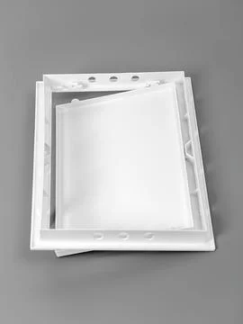 White plastic hatch on a gray background. Rectangular shape. Stock Photos