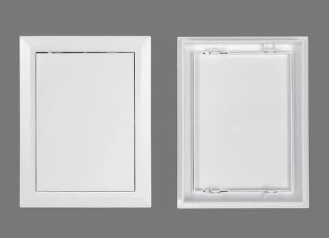 White plastic hatch on a gray background. Rectangular shape. Top view. Door f Stock Photos