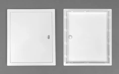White plastic hatch on a gray background. Rectangular shape. Door for acces.. Stock Photos