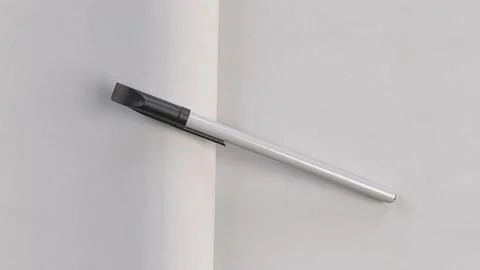 White plastic pen in notebook with white sheet, top view Stockillustratie