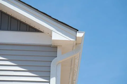 White plastic rain gutter maintenance rain gutter before rainy season Stock Photos