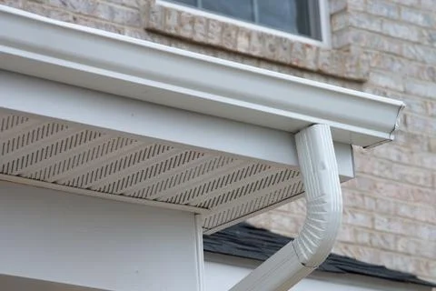 White plastic rain guttering system guttering drainage pipe exterior Stock Photos