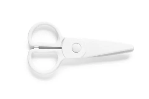 White plastic safety scissors on white background Stock Photos