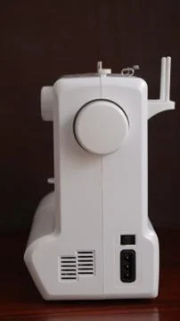 White plastic sewing machine, sewing machine device Stock Photos