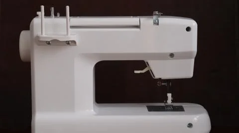 White plastic sewing machine, sewing machine device Stock Photos