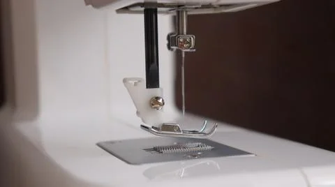 White plastic sewing machine, sewing machine device Stock Photos