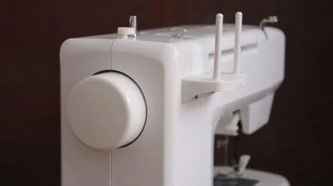 White plastic sewing machine, sewing machine device Stock Photos