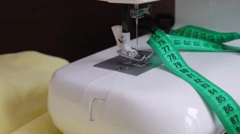 White plastic sewing machine, sewing machine device Stock Photos