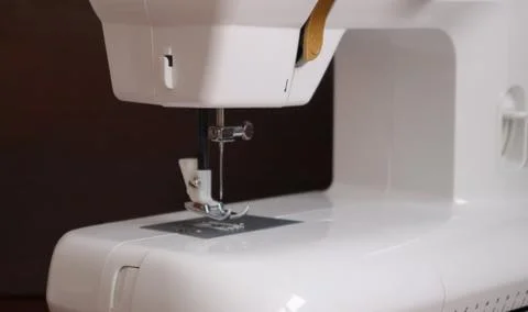 White plastic sewing machine, sewing machine device Stock Photos