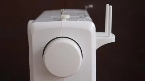 White plastic sewing machine, sewing machine device Stock Photos