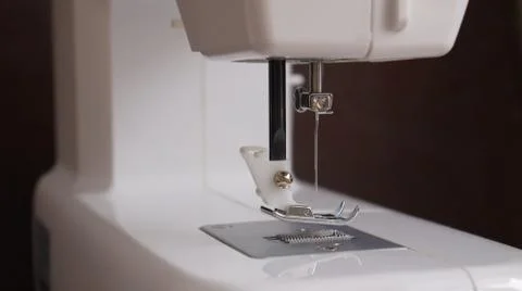 White plastic sewing machine, sewing machine device Stock Photos
