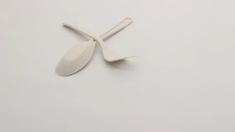 White plastic spoon and fork isolated Stock Photos