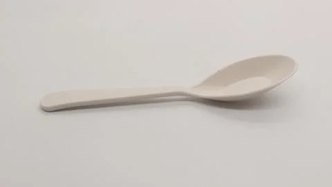 White plastic spoon and fork isolated Stock Photos