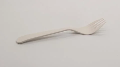 White plastic spoon and fork isolated Stock Photos