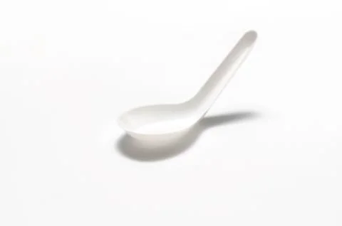 White plastic spoon Stock Photos