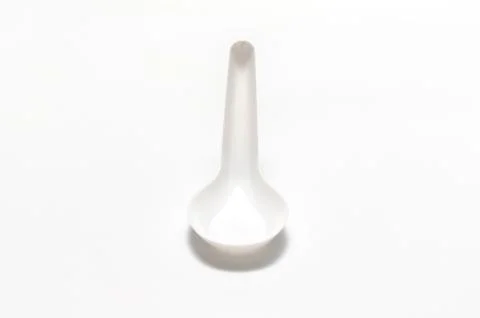 White plastic spoon Stock Photos