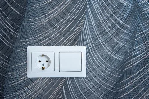 White plastic switched double socket. Light switch and power socket control p Stock Photos