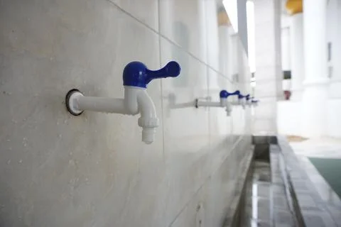 White plastic tap Stock Photos