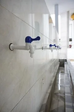 White plastic tap Stock Photos