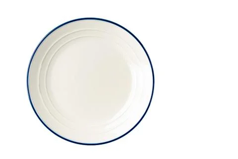 White plate with a blue stripe on the edge. Stock Photos