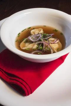 White plate with onion mixed cheese soup Stock Photos