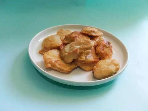 A white plate put fried snack. 写真素材