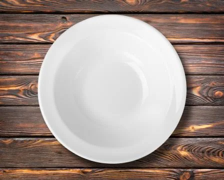 White plate on a table Stock Photos