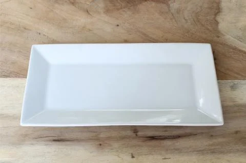 White plate on the table Stock Photos