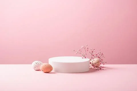 White podium with Easter quail eggs Stock Photos