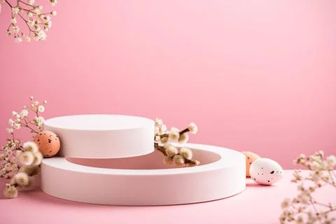 White podium with Easter quail eggs Stock Photos
