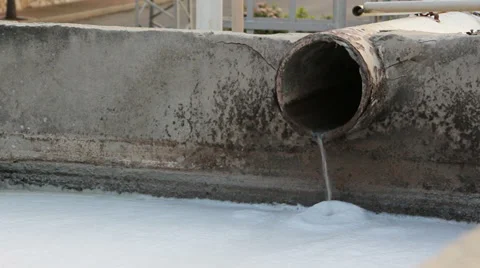 White pollution out of a pipe Stock Footage 36155225
