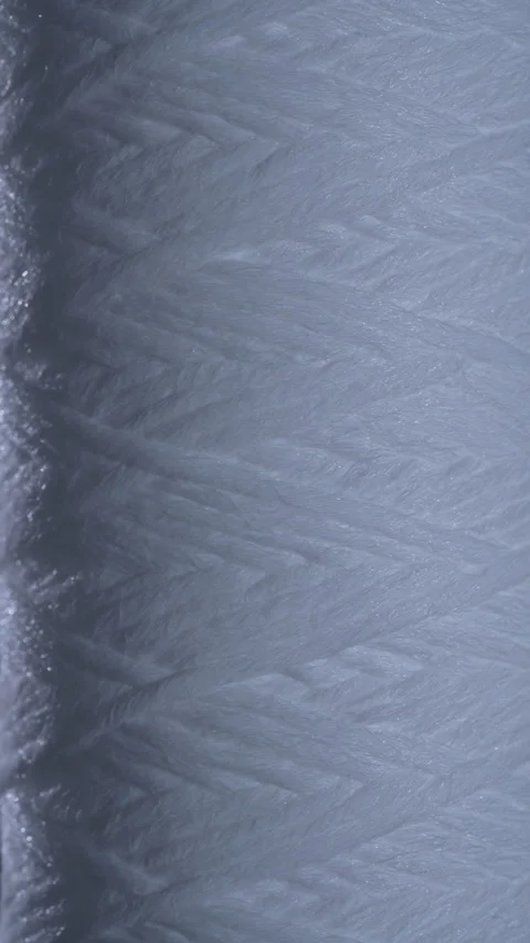 White polypropylene string wound sediment replacement filter, texture background Video stock 345815346