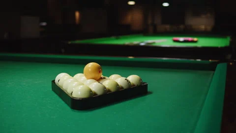 White pool balls close-up on green billiards table for start to play. Russian Stock Footage 257597565