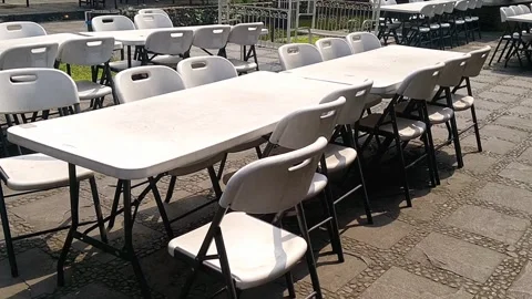 White Portable Folding Table And Chair Set With Black Steel Frame Stock Footage 339377352