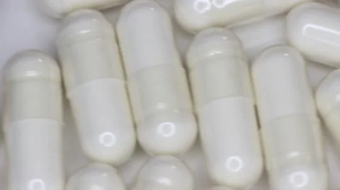 White Powder Capsules Vídeos de archivo 66293273