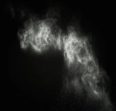 White powder exploding isolated on black Foto stock