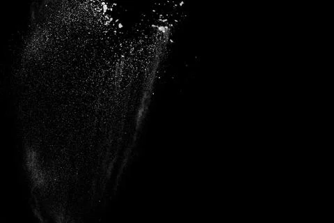 White powder explosion on black background Stock Photos