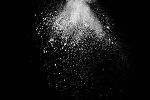 White powder explosion on black background Stock Photos