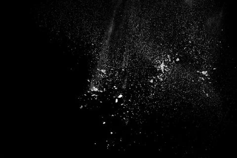 White powder explosion on black background Stock Photos