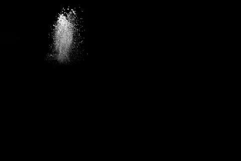 White powder explosion on black background. Stock Photos