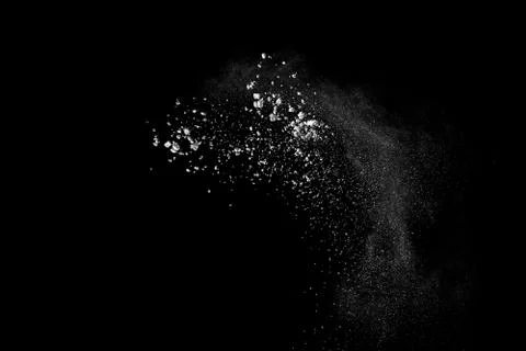 White powder explosion on black background. Stock Photos