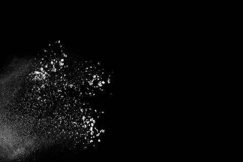 White powder explosion on black background. Stock Photos
