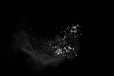 White powder explosion on black background. Stock Photos