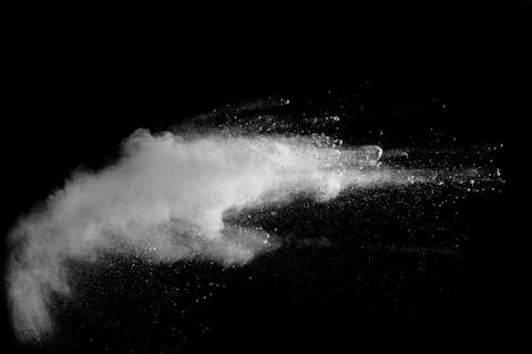 White powder explosion on black background. Stock Photos