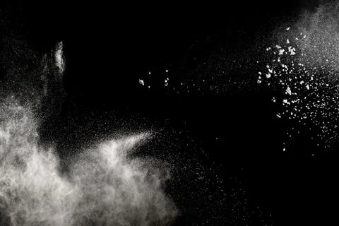 White powder explosion on black background. Stock Photos
