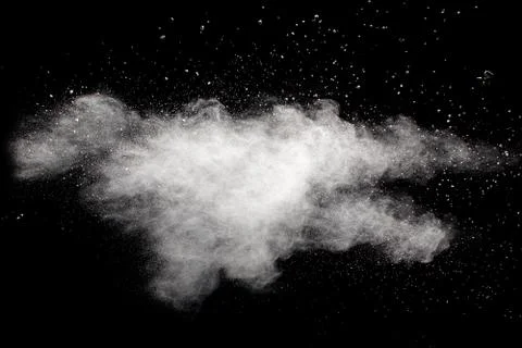 White powder explosion on black background. Stock Photos