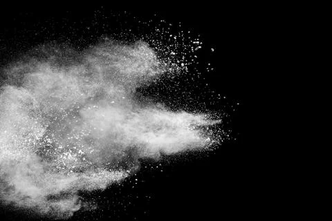 White powder explosion on black background Stock Photos