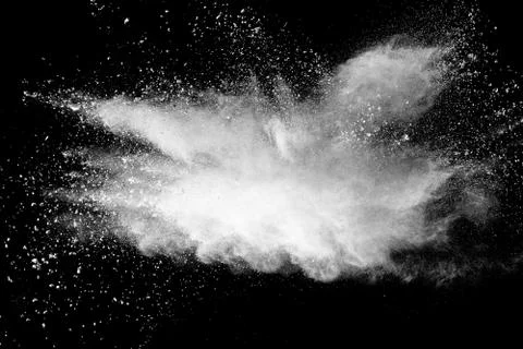 White powder explosion on black background. Stock Photos
