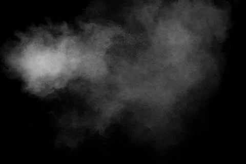 White powder explosion clouds.Freeze motion of white dust particles splash .. Stock Photos