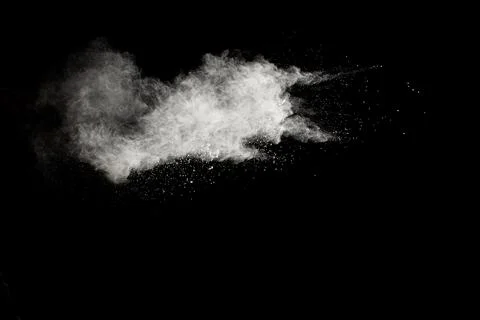 White powder explosion clouds.Freeze motion of white dust particles splash .. Stock Photos